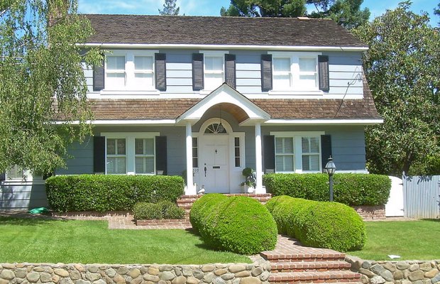 Colonial home with plantation shutters